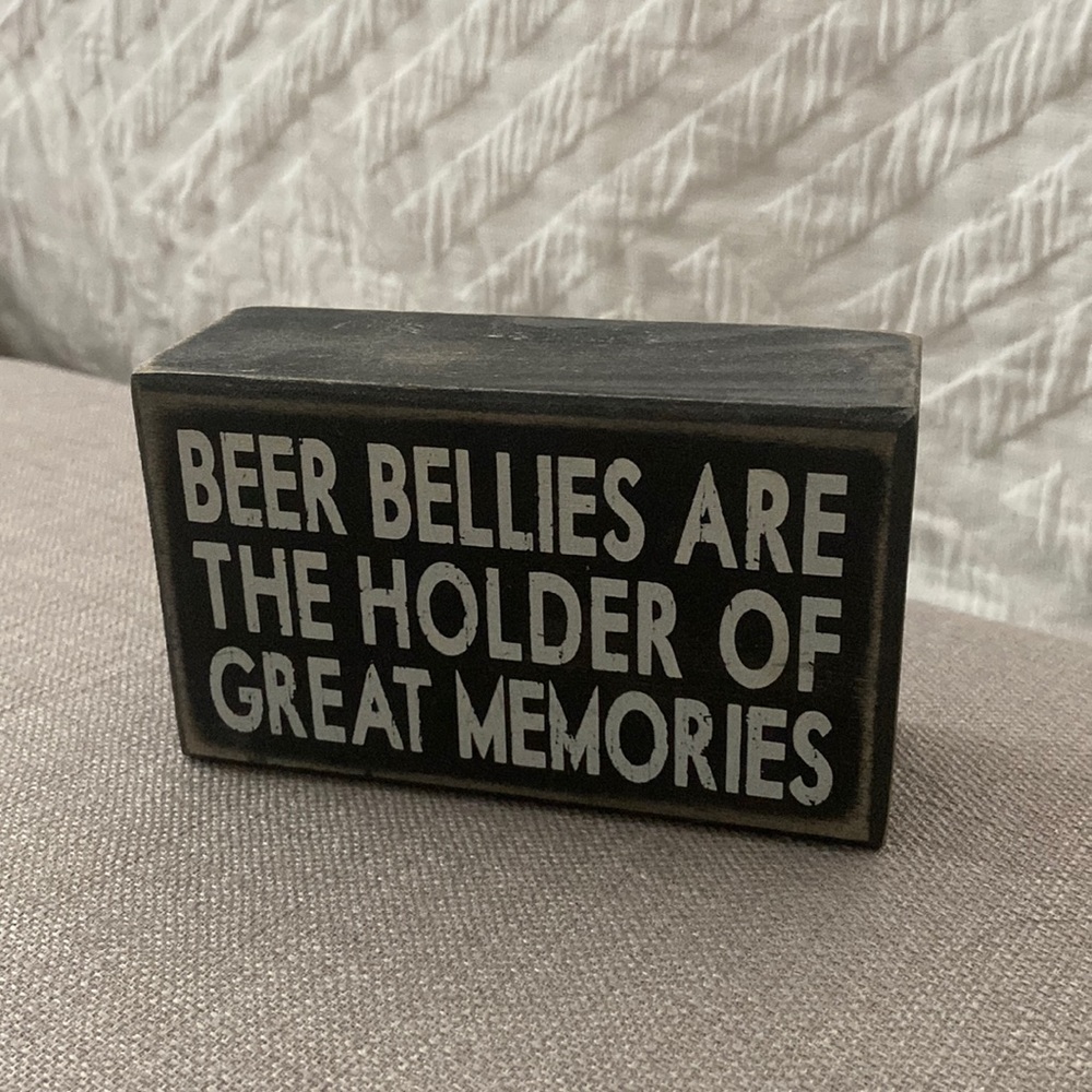 Beer bellies are the holder of great memories sign